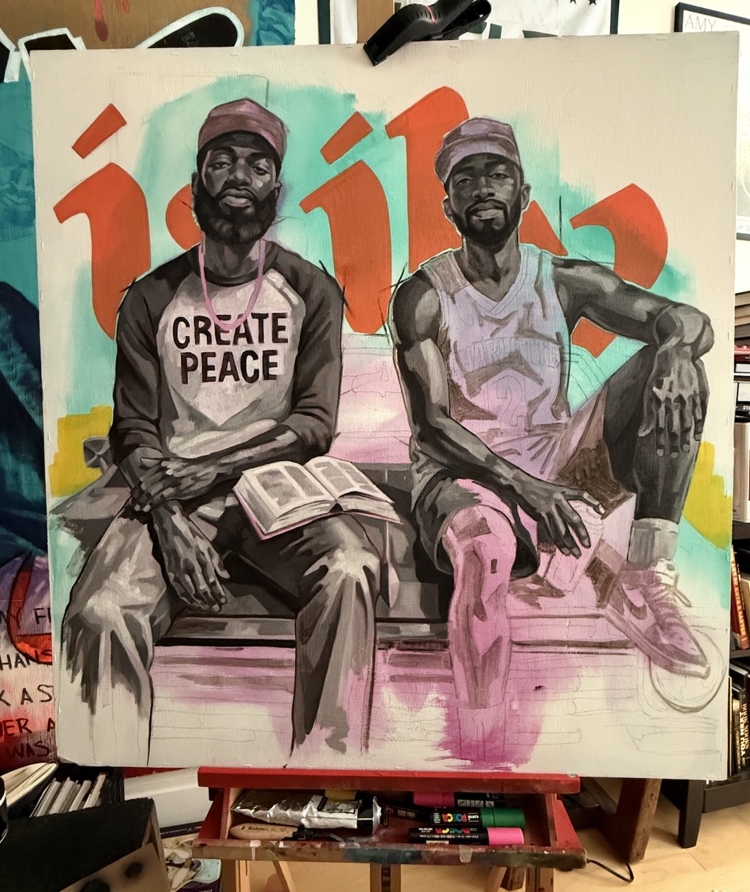 Create Peace, diptych painting of two men seated together